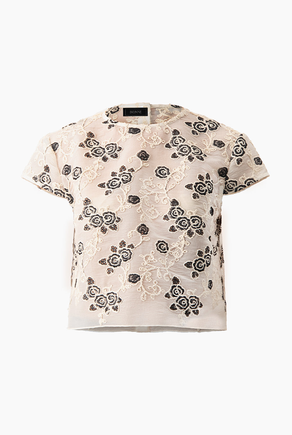 Blusa corta natural con cuello redondo y bordado floral