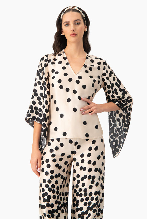 Blusa estampada de lunares con manga amplia y escote en V